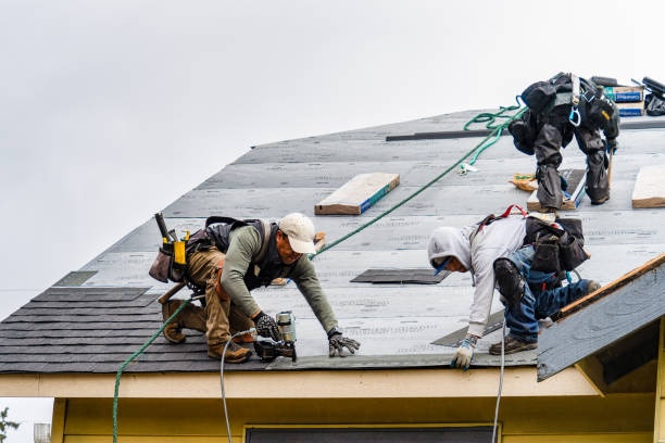 Professional Roofing technician working in De Ruyter, NY